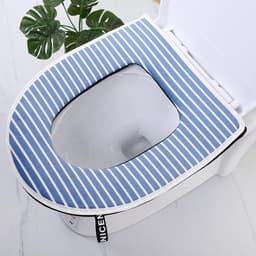 Polstret toalettsetetrekk blå