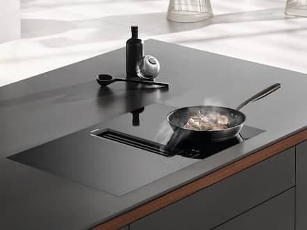 Bordemfang i plan med bordpladen