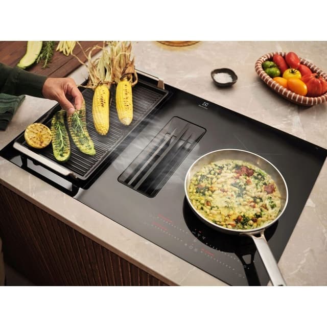 Få en större tillagningsyta med Bridge-funktionen