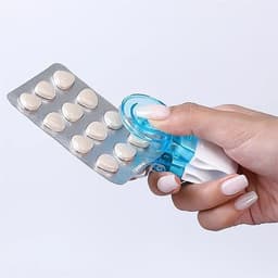 Tablettipuristin lääkepakkauksille