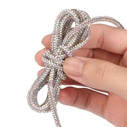 Glitrende rhinestone skolisser 140 cm (par)