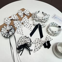 10-osainen Polka Dot -päänauhasetti, jossa on rusetti