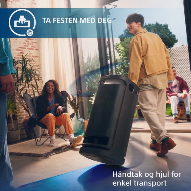 En gutt trekker en Sony SRS-XV900 trådløs høyttaler etter seg og teksten Ta festen med deg, håndtak og jul for enkel transport
