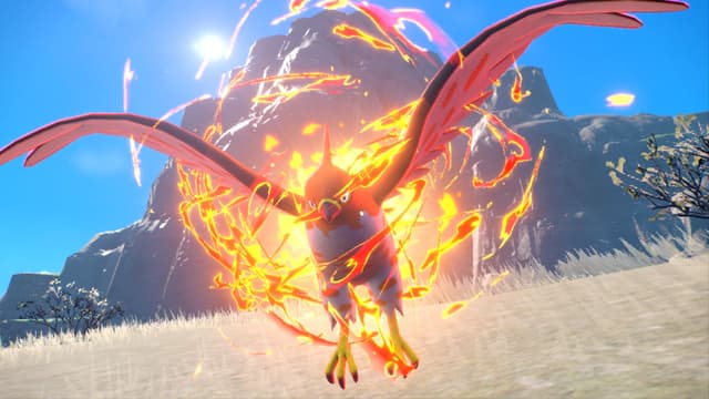 Kuvakaappaus Pokemon-pelistä, jossa on liekeissä oleva lentävä pelihahmo