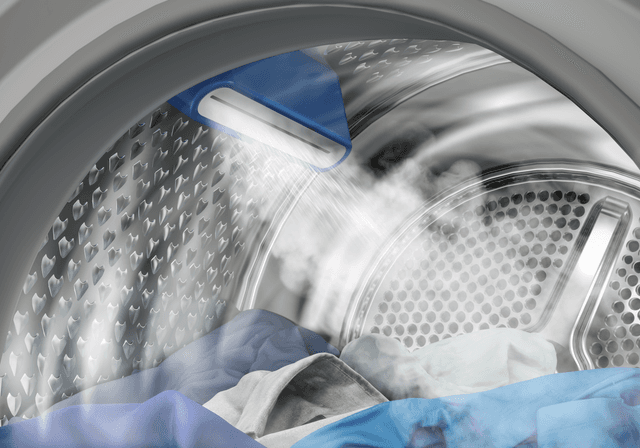 Billede af indersiden af en Beko-tørrerumbler med SteamCure-funktion