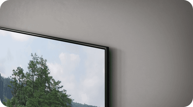 L'ähikuva Samsung Q70C -televisiosta harmaalla seinällä