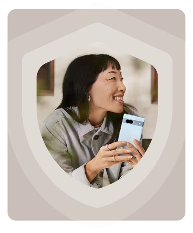 Woman with a Google Pixel 7a in a security logo