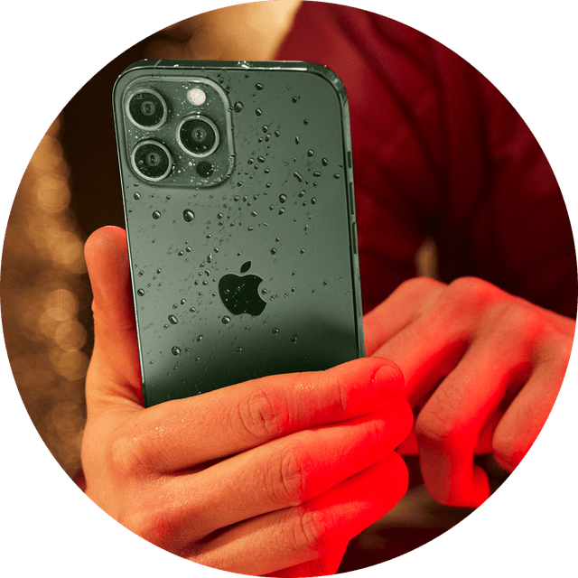 Hands holding an iPhone