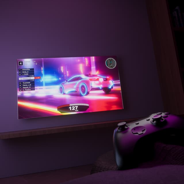 Philips PUS7608 -televisio, jossa näkyy kuva ajopelistä, sekä peliohjain sen edessä