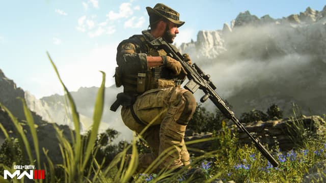 Screenshot of Captain Price crouching in a field with his gun