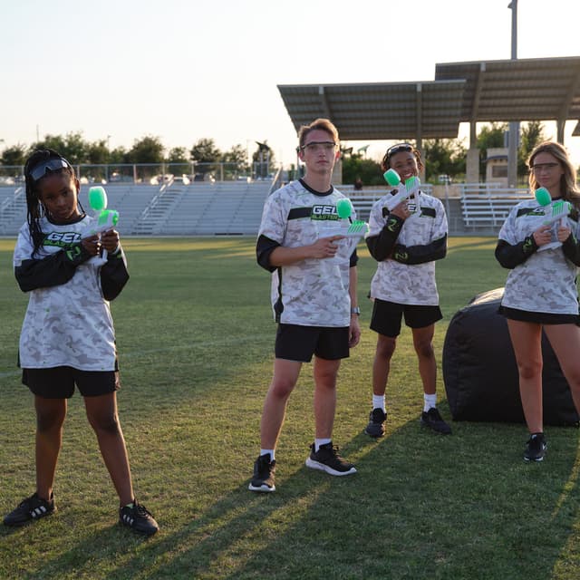 Gel Blaster - Kids holding Gel Blaster Surge on a field