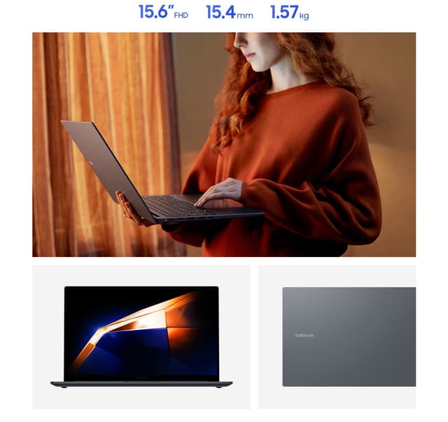 A woman holding a Galaxy Book4 while typing on it