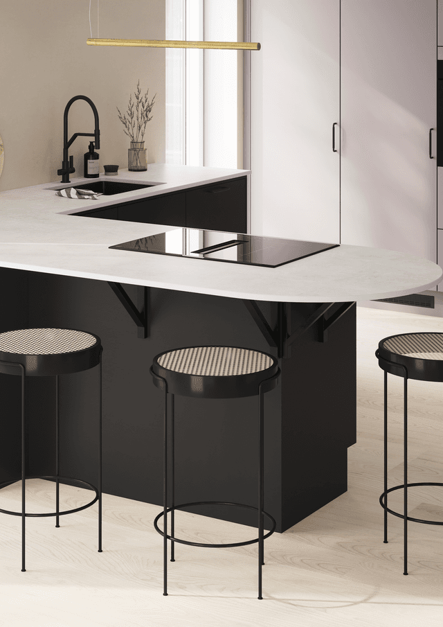 White worktop and black fronts and chairs