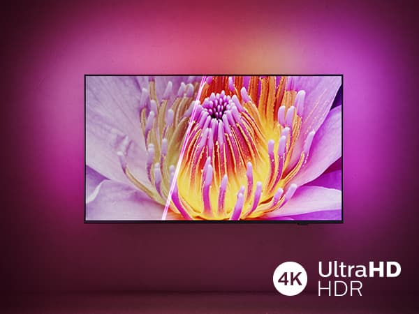 4K Ultra HD LED TV med pink og gul blomst på skærmen