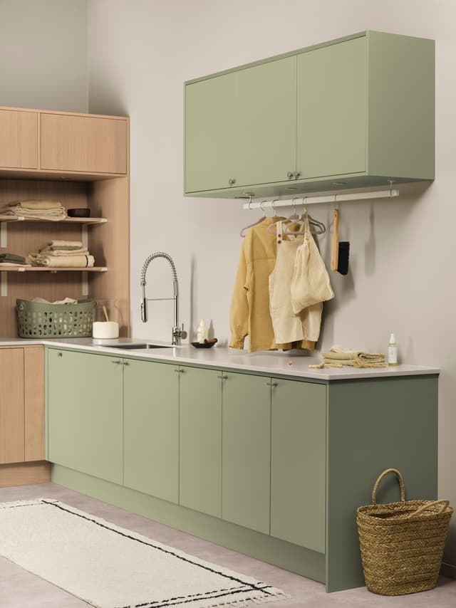 Epoq Core Pale Olive Laundry room with light green and Natural oak cabinets