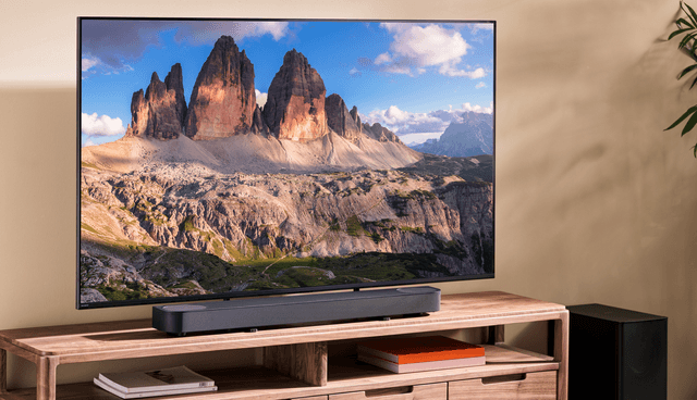 Sony Bar6 - BRAVIA Theatre Bar 6E 3.1.2 under a TV in a living room
