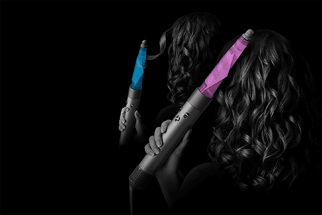 2 Dyson Airwrap™ multi-stylers og nærbilde av konisk barrel