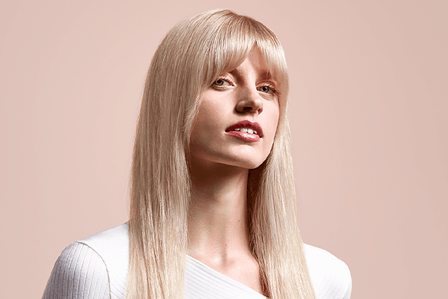 Dyson Airstrait™ straightener - Light haired girl with long styled hair