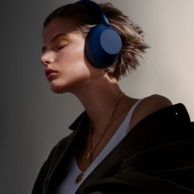 Woman with Sony WH-1000XM6 headphones