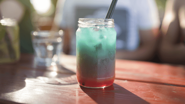F&B Soft Serve - F&B Soft Ice Cream and Slushie Maker - Gradient coloured summer drink on a table