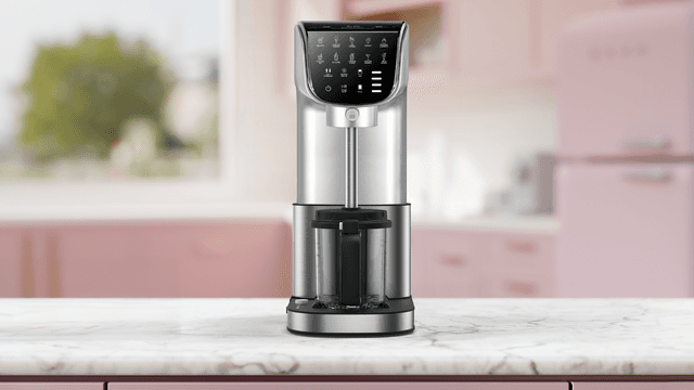 F&B Soft Serve - Ice Cream & Slushie Maker on a table in a pink kitchen