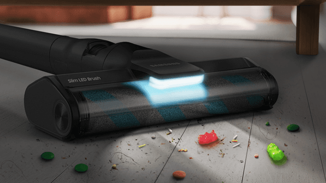 Samsung Bespoke Jet AI Ultra with LED-light vacuuming candy on the floor