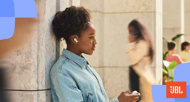 Woman wearing JBL True Wireless in-ear headphones