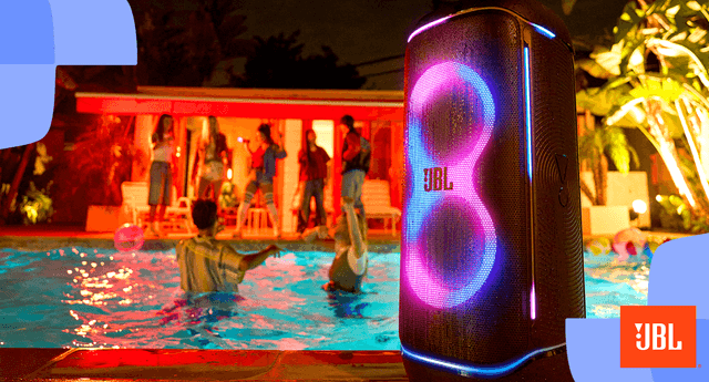 JBL PartyBox playing while people are partying in the background
