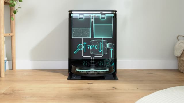 Bosch Spotless Max robotstøvsuger dockingstation på gulvet med et kig ind i