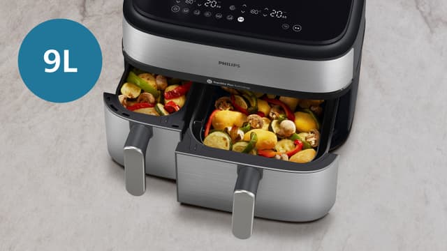 Philips Airfryer 5000 viser de dobbelte kurve med 9 liters kapacitet, fyldt med mad