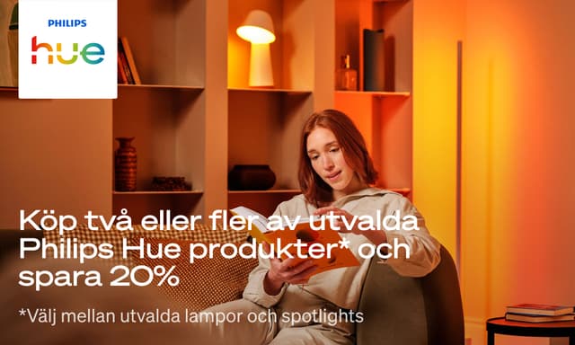 Kvinna som läser en bok i fotölj och texten; Köp 2 eller fler av utvalda Philips Hue produkter* och spara 20%.