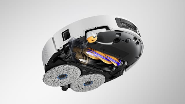 Illustrasjon av en Dreame X60 Ultra-rengjøringsrobot vist fra undersiden.