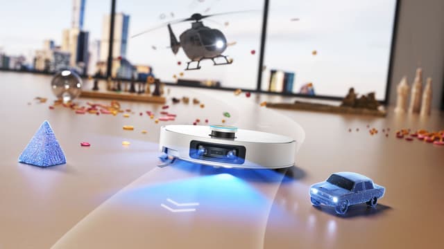 Kuvituskuvassa Dreame X60 Ultra -robottipölynimuri navigoi lelujen keskellä lattialla ja siivoaa roskia pois