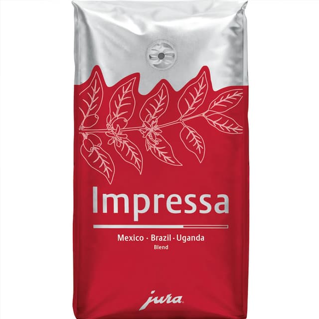 Påse med Jura kaffebönor mot vit bakgrund