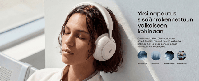 Nainen kuuntelee valkoista kohinaa valkoiset Soundcore Space 2 -kuulokkeet päässään