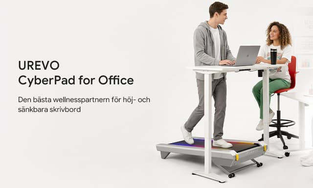Man som går och arbetar på UREVO CyberPad for Office bredvid två kollegor