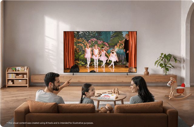Parents and their daughter sitting on a couch in a living room, watching a dance performance on TV.