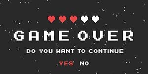 Mustavalkoinen Game Over -näkymä punaisilla sydämmillä