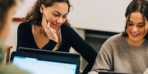 Computing - AI PC - Young women using laptops while studying