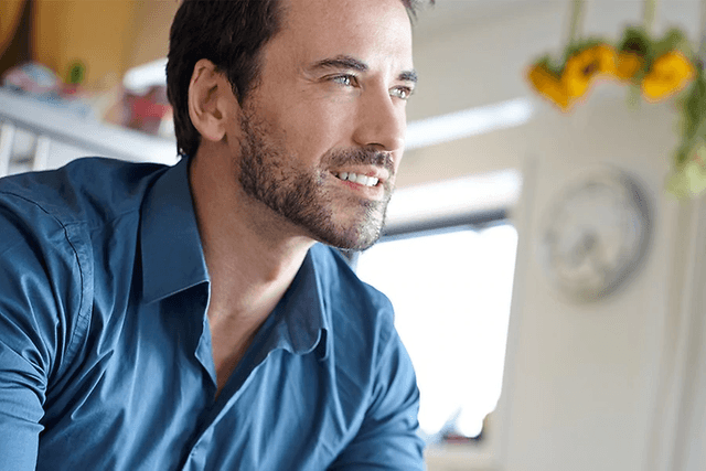 Man with beard smiling