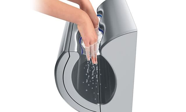 Dyson Airblade dB håndtørrer med hænder i den
