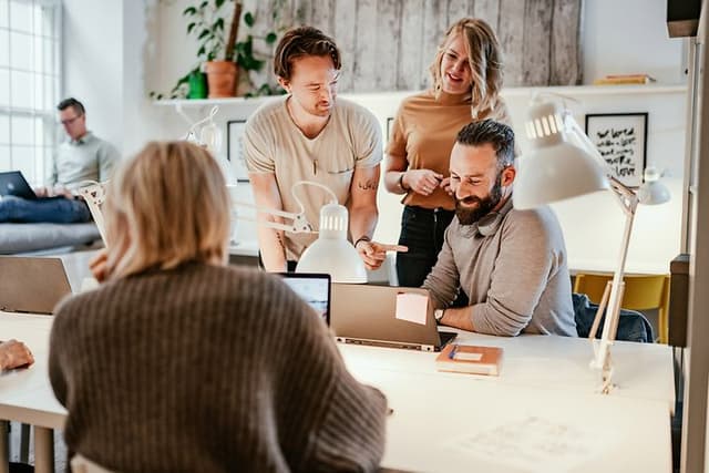 A small group of people in a meeting