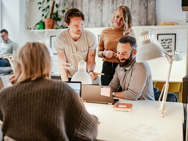 A small group of people in a meeting