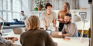 A small group of people in a meeting