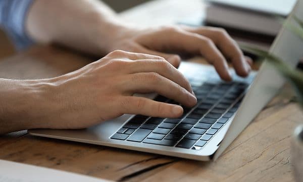 Person working on a laptop