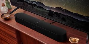 TV med en svart sonos beam 2 soundbar placerad under. 
