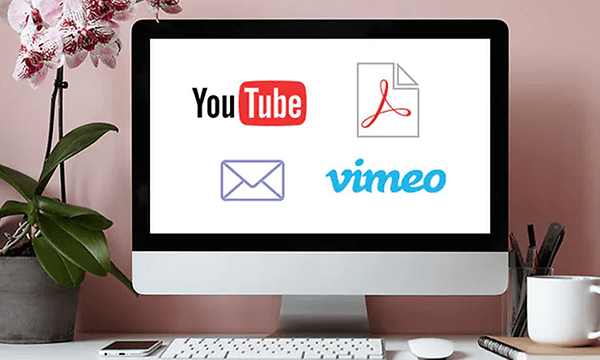 iMac med olika videotjänster och mejlikoner
