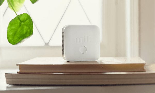 Mill - heating - Mill sense på en haug av bøker