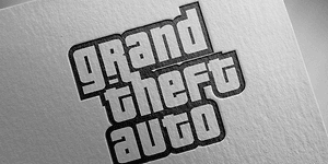 Gaming: Grand theft auto (GTA) logga på ett vitt papper.