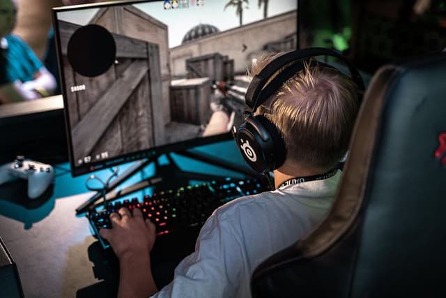 Boy playing Counter Strike Global Offensive
